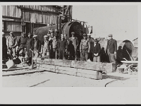 carrara photo o2 see descript  American-Electro Thermo Company Workers. Date unknown. From left to right is painter, Bert Miller, George Probasco, Robert Ginson, Arnold Perry, Paul Payne, L. E. Scott, E. N. Shirley, unidentified, Carl Earl, "Blackie," Aubrey Smith, C. E. Merkel, and A. A. Hall. Charles Thomas-Perry Photographs (PH-00150) Courtesy UNLV
