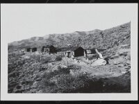 Abandoned homes sit in the desert in Johnnie, Nevada.  Abandoned homes at Johnnie, some time in 1940's or 1950's, courtesy ULV