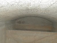 p1010066  The inside of one of the underground concrete &#34;septic tanks&#34; which is fed by a pipe. But for what? And what&#39;s with the wall? His and hers?