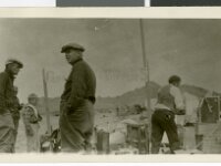 UNLV Wahmonie gold rush makeshift store c. 1928-29. Earl Rockwell; Leon Rockwell, jr.; George Hanford; C. V. T. Gilbert  A makeshift store, showing Earl Rockwell, Leon Rockwell, Jr., and George Hanford. 1928 Courtesy UNLV